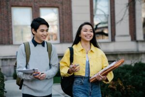 young man and woman walking together