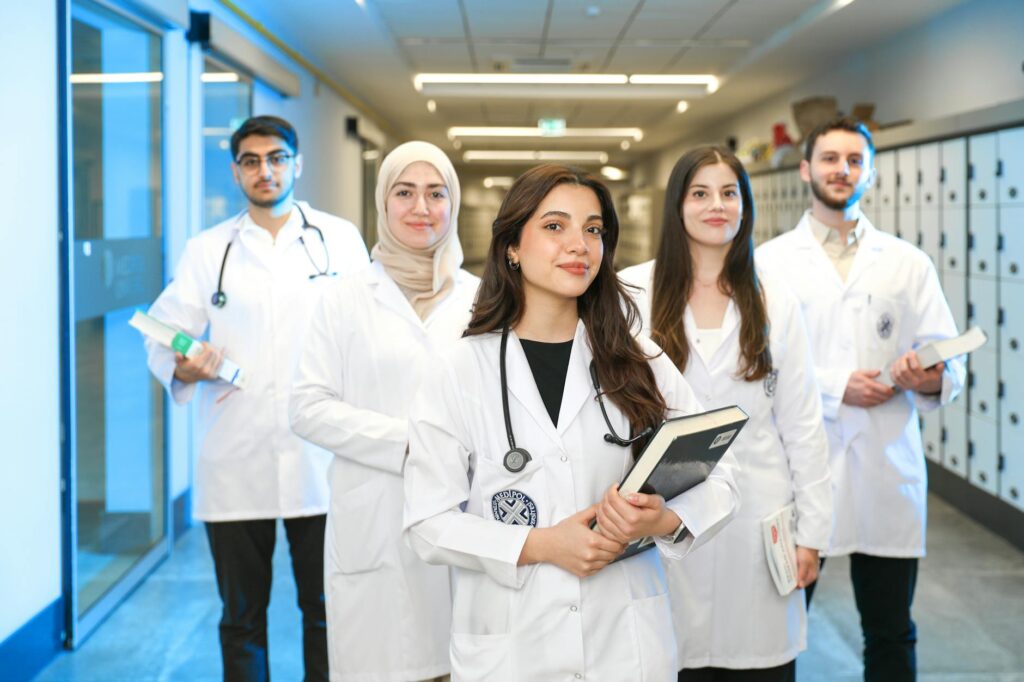 young medical students in university hallway