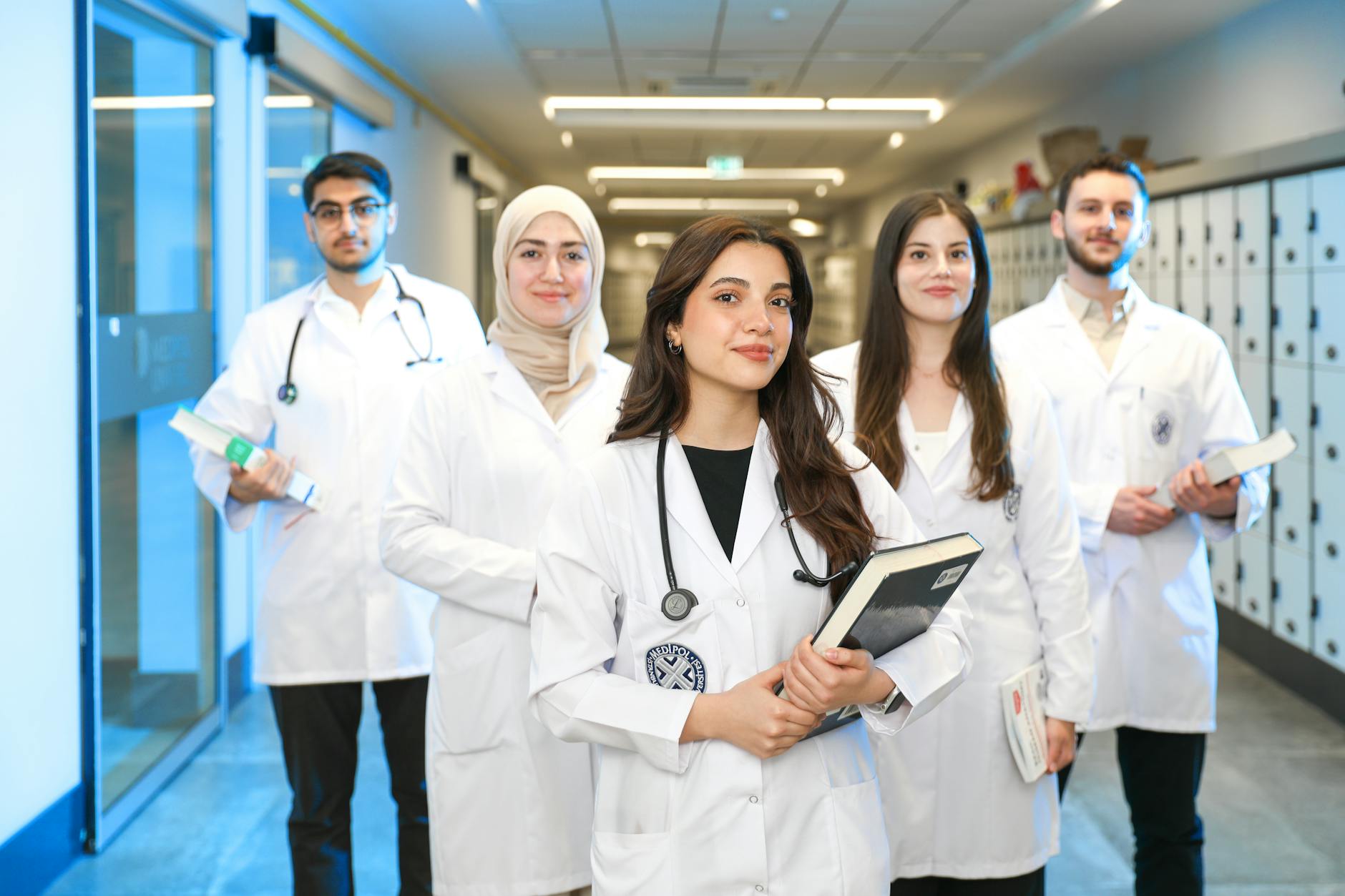 young medical students in university hallway